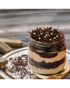 Gluten free chocolate truffle jar cake with rich chocolate layers and creamy frosting in a glass jar