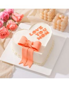 Love You Mom cake with elegant cream design and heart decoration