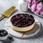 gluten free blueberry baked cheesecake with fresh berries