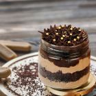 Gluten free chocolate truffle jar cake with rich chocolate layers and creamy frosting in a glass jar