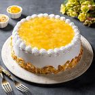 Premium pineapple cake with fresh cream and juicy pineapple chunks